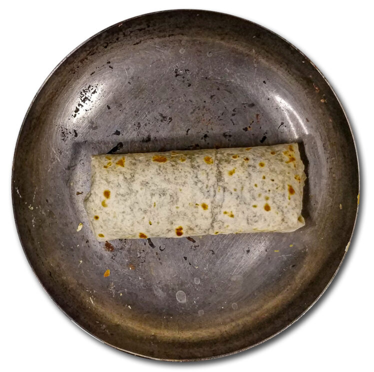 Lägg burriton med skarven nedåt i en stekpanna och stek ungefär en minut